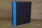 Preview: black folder with blue linen corners
